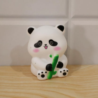 Actual photograph of panda hugging bamboo night lamp