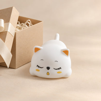 Cat lamp styled beside a gift bag