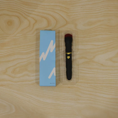 Actual photograph of makeup brush and box