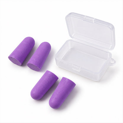 Four purple foam earplugs arranged around an open clear plastic storage case on a white surface.