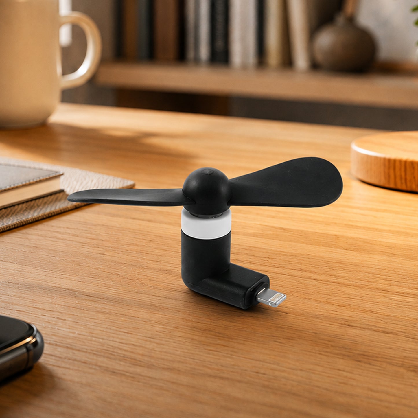 Mini USB mobile fan on desk