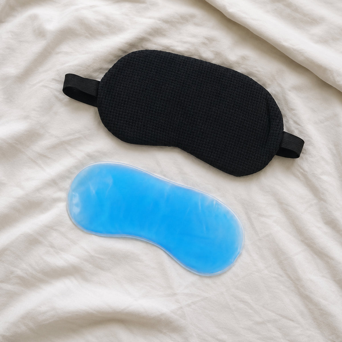 Eye mask with removable cooling gel insert