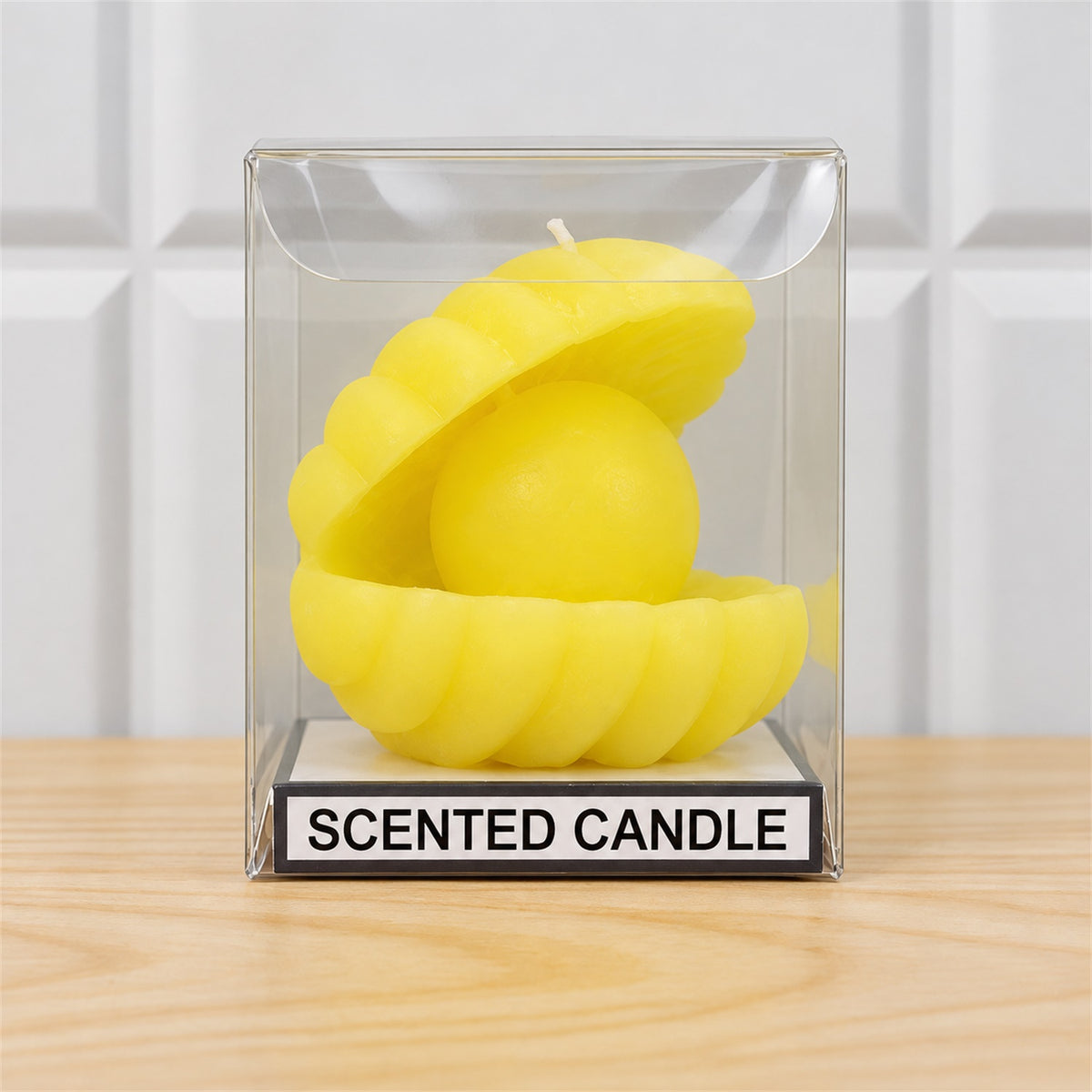 Shell shape scented wax candle with pearl-style centre actual product