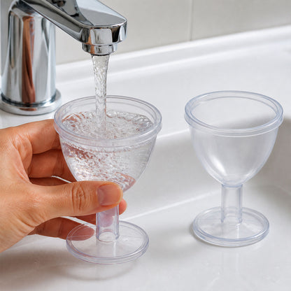 Transparent reusable eye wash cup filling view