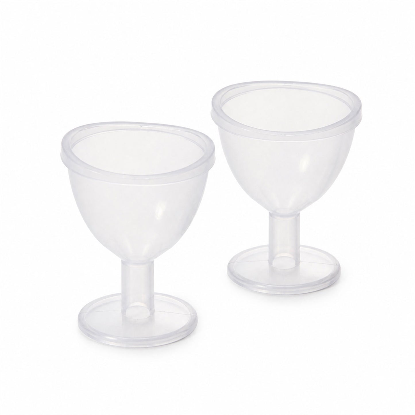 Transparent eye wash cup set on white background