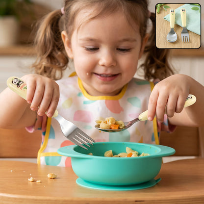 Kids cartoon spoon and fork set in use
