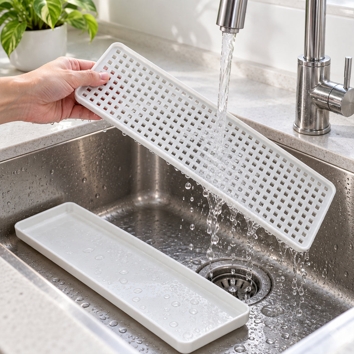 Removable drain rack being rinsed