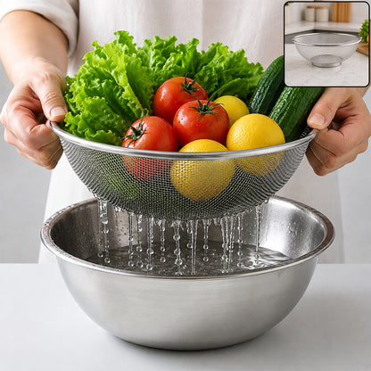 Stainless steel mesh strainer bowl with fresh vegetables