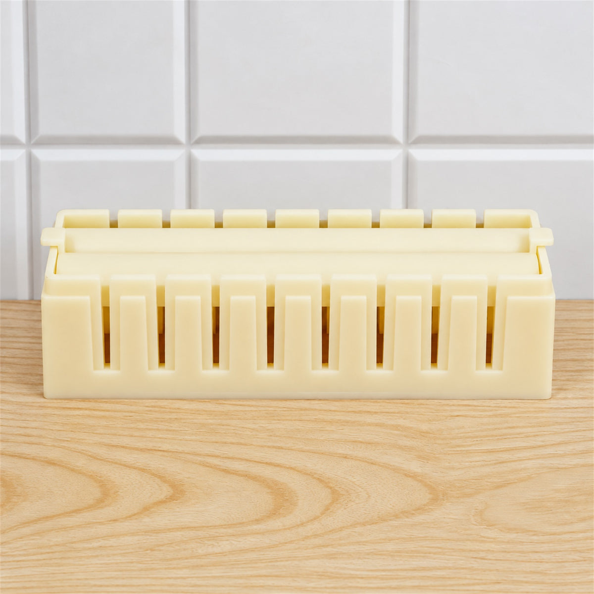 Sushi roll maker mold with removable press and slicing guide, actual product photo
