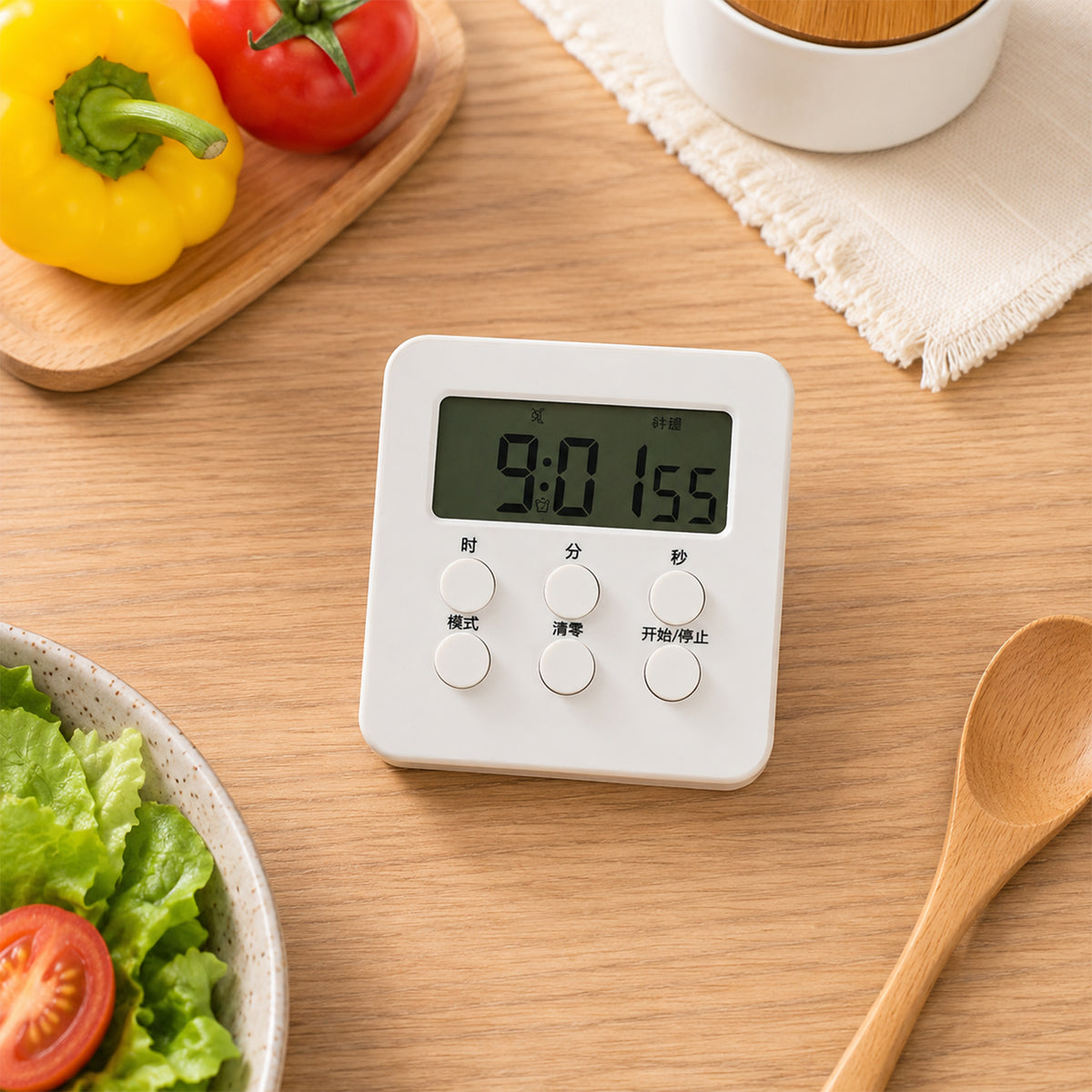 Digital timer placed near kitchen ingredients