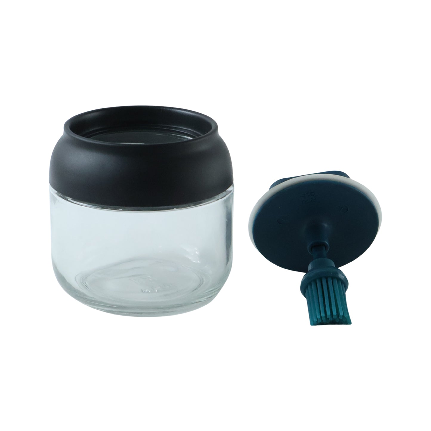 round glass oil dispenser white background