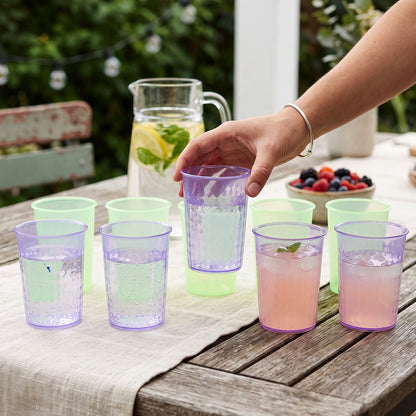 Colorful reusable plastic drinking glasses set for outdoor table