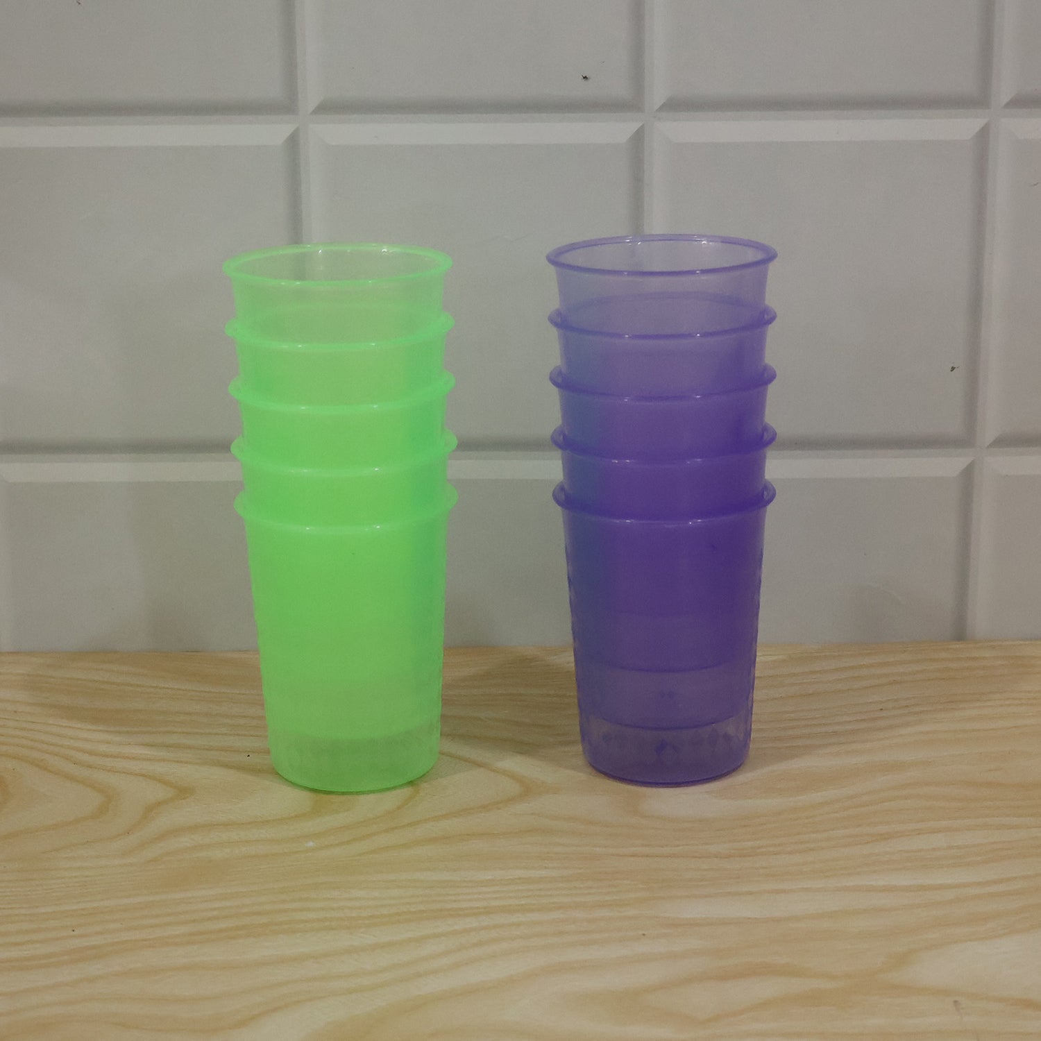 Live product photo of stacked plastic glasses