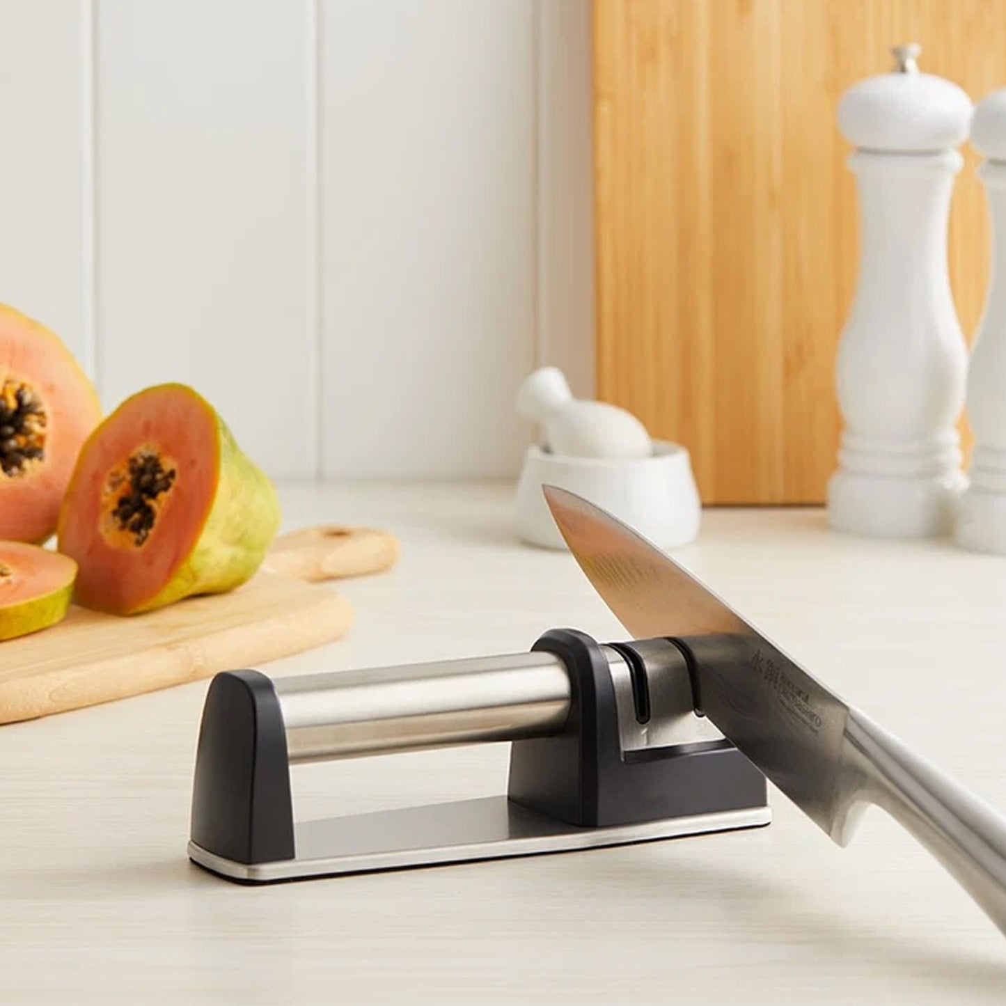 Kitchen knife sharpener in use
