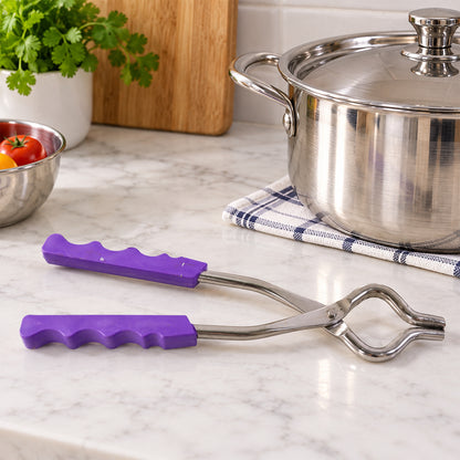 A stainless steel pot lifter with purple handles on a white marble counter, next to a stainless steel pot and a checkered