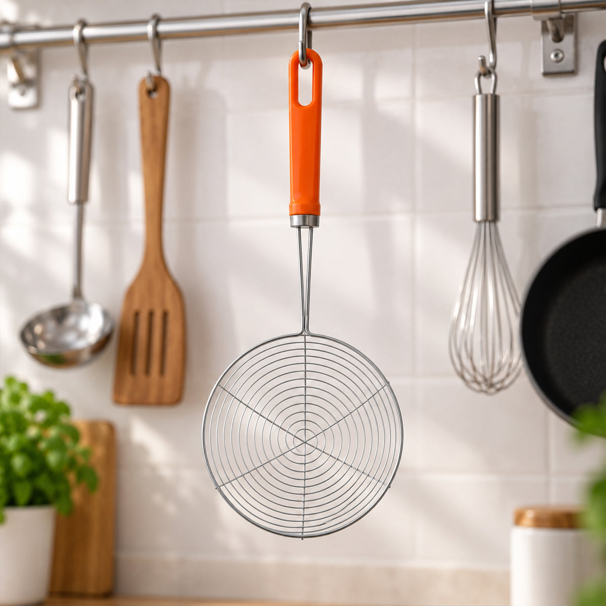Strainer hanging from kitchen rail