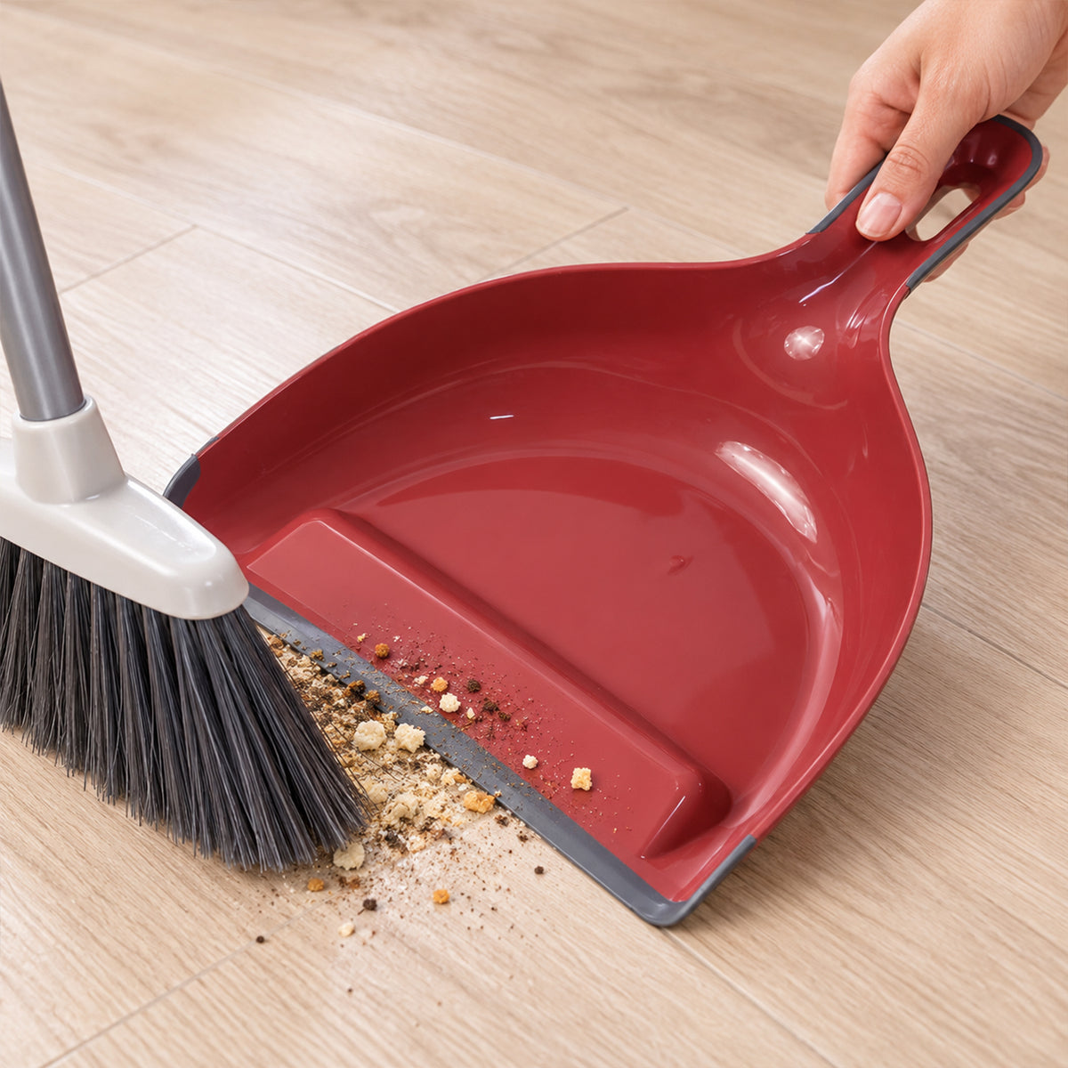 Dust pan with flexible front edge and hanging handle 3