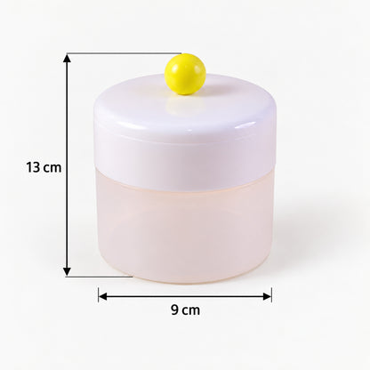 The assembled white and translucent ice cube maker with a yellow knob is shown with dimensions of 13 cm height and 9 cm