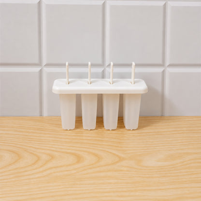 Various fruit ingredients arranged around the plastic 4-cavity popsicle mold