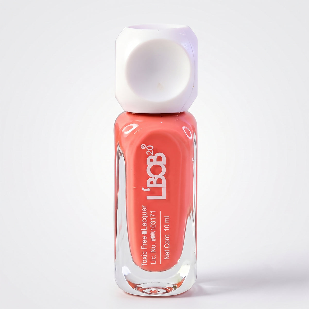 Peach Pink glossy nail polish, 10 ML, white background view