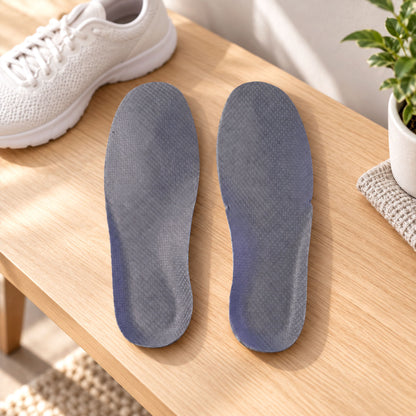 Grey cushioned shoe insoles pair