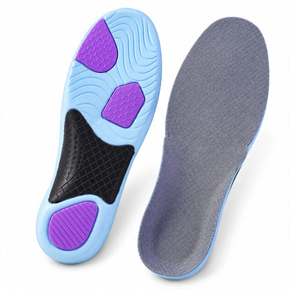 Pair of cushioned shoe insoles on white background