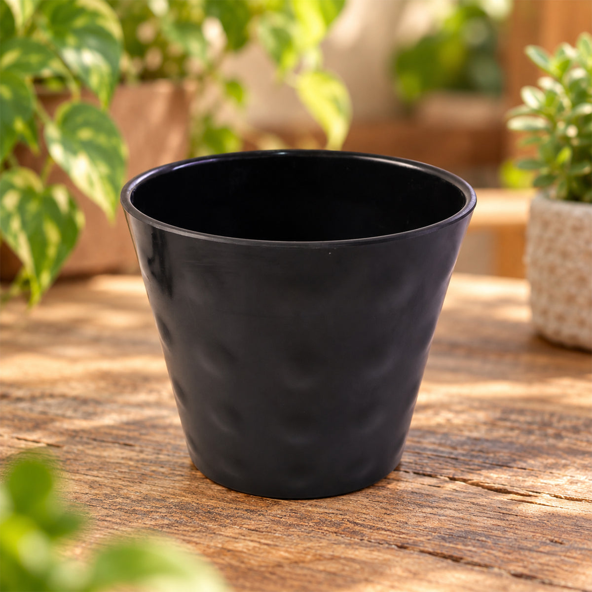 Decorative plastic flower pot detail view