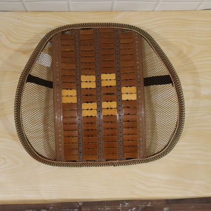 Mesh seat back support with wooden bead panel and securing strap live