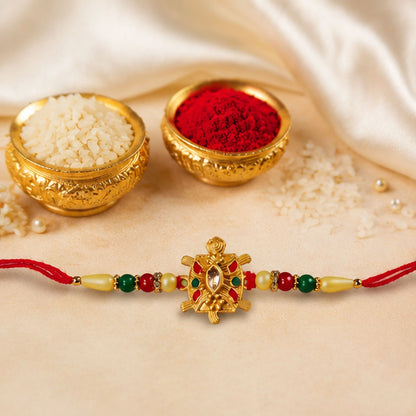 A brother's hand adorned with the beautiful Turtle Rakhi during Rakshabandhan celebrations.