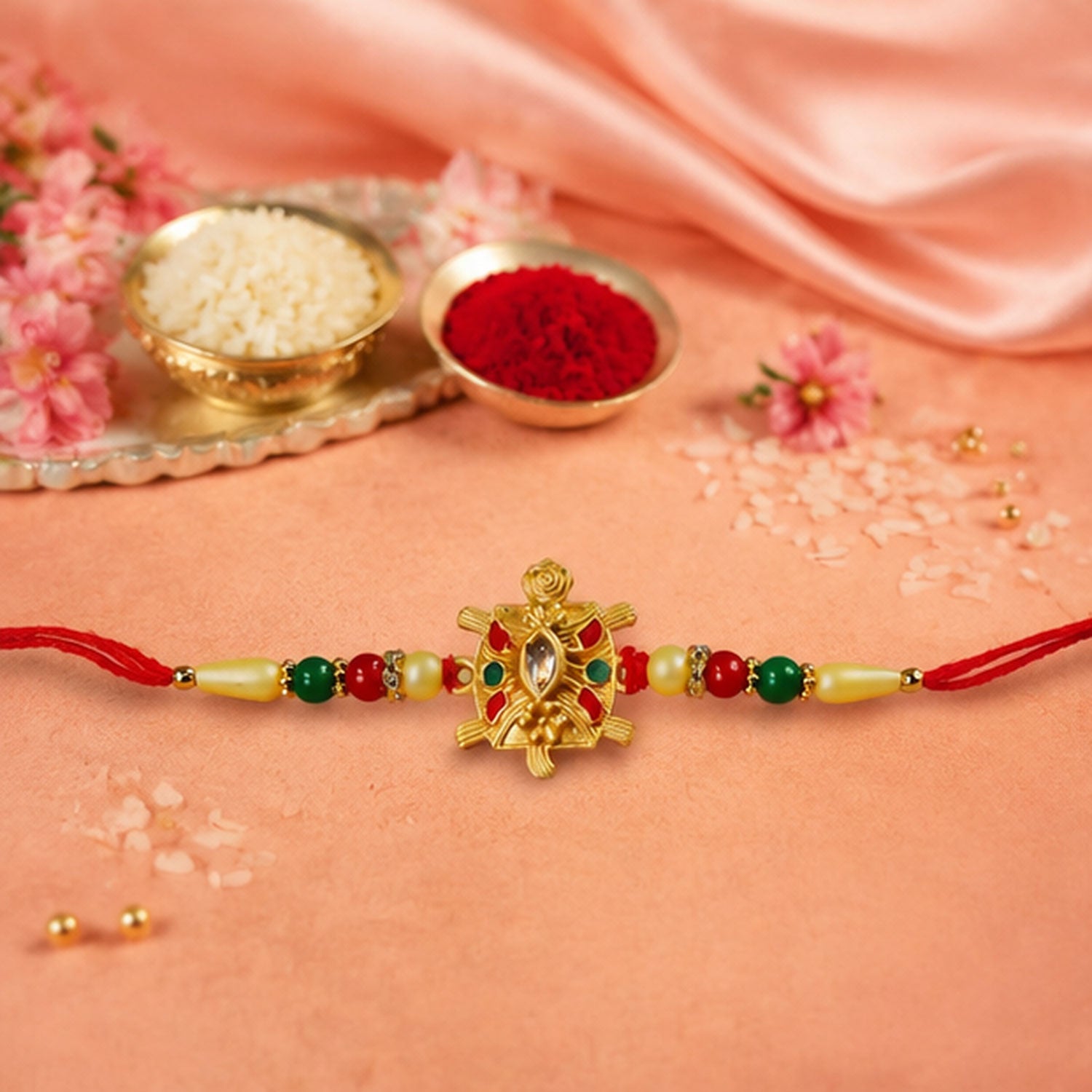 Stylish presentation of the Turtle Rakhi in its festive packaging, ready for gifting.