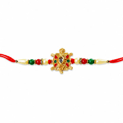 Side view of the handcrafted Turtle Rakhi, highlighting its unique turtle motif.