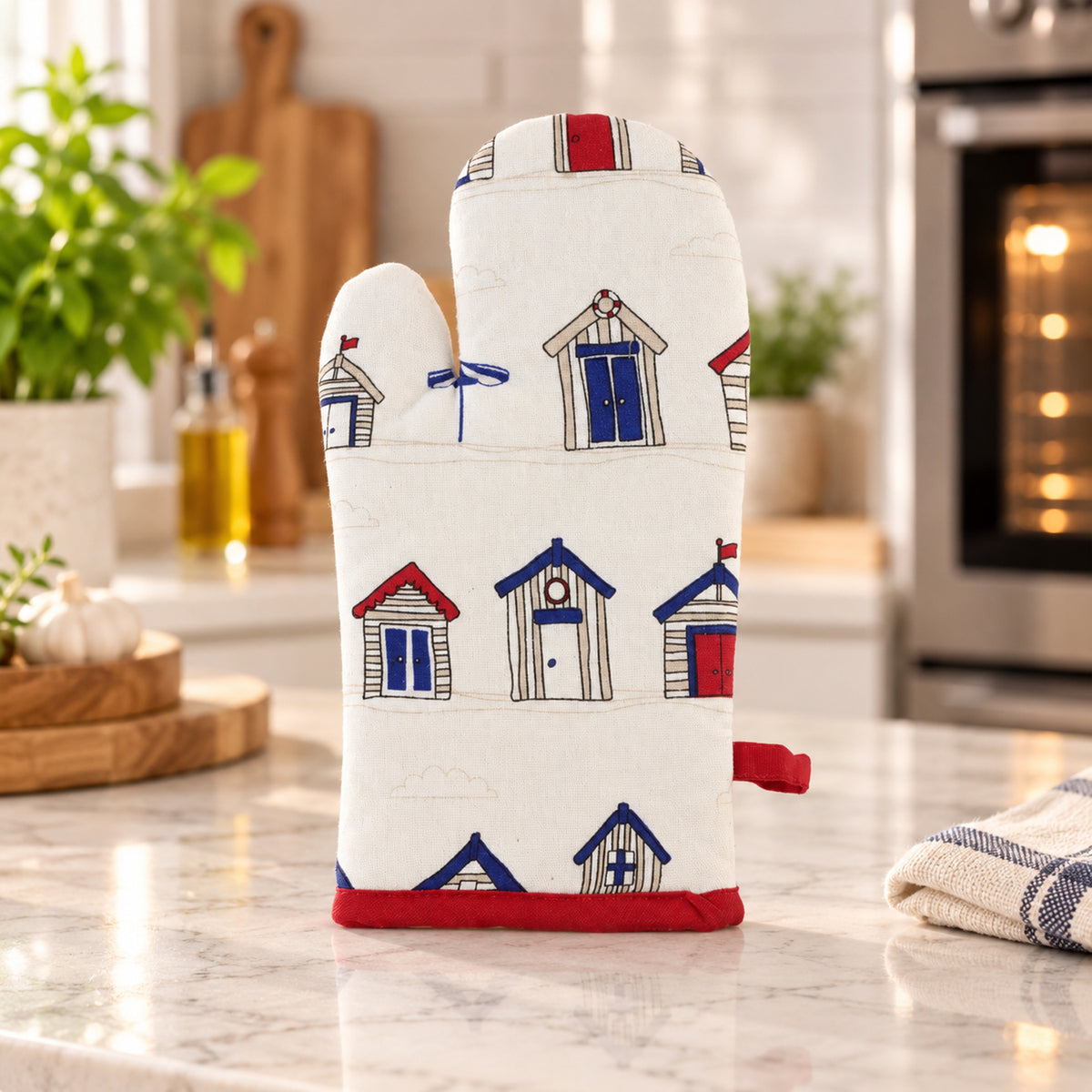 Beach hut print quilted oven hand glove - kitchen counter display