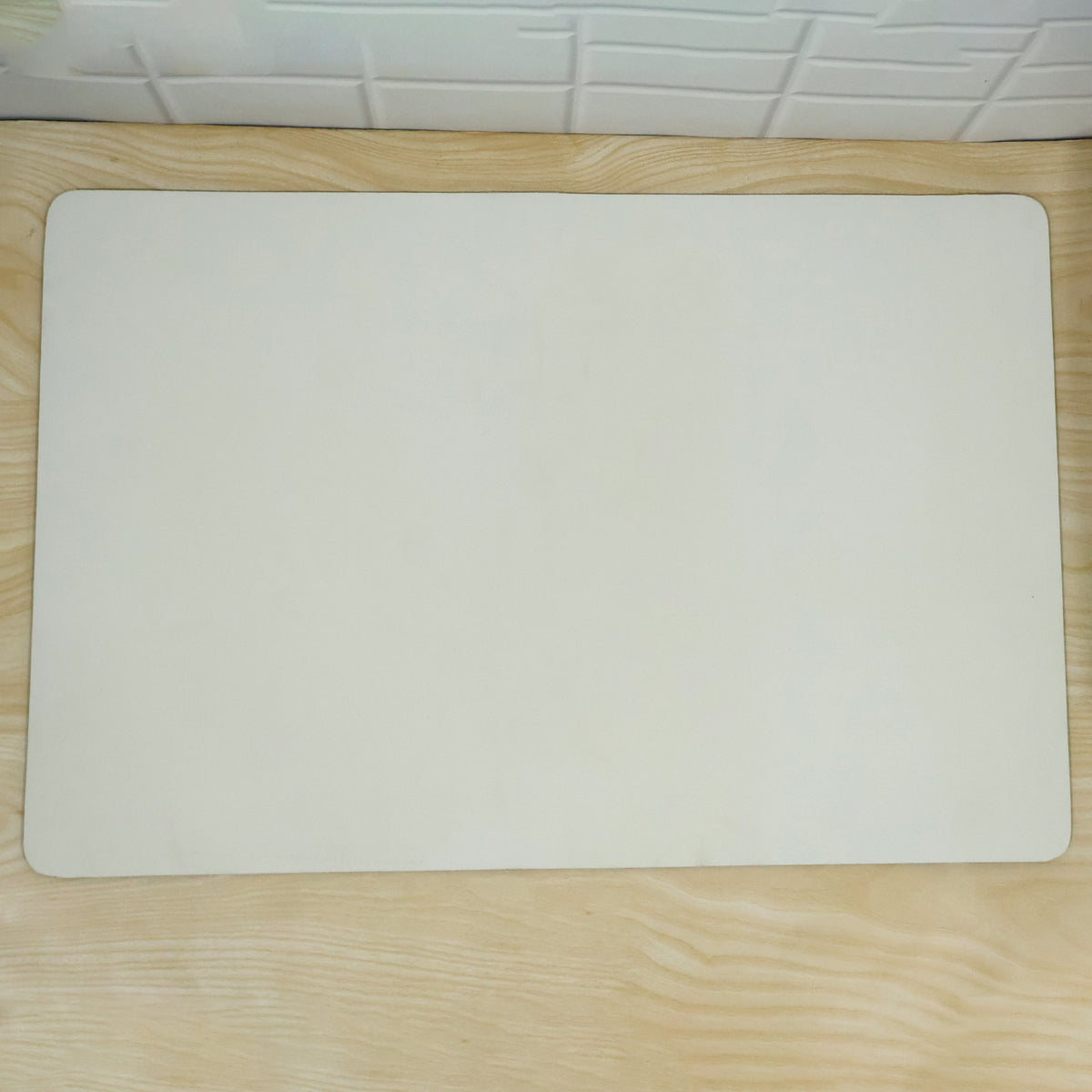 Decorative rectangular floor mat with rounded corners actual product