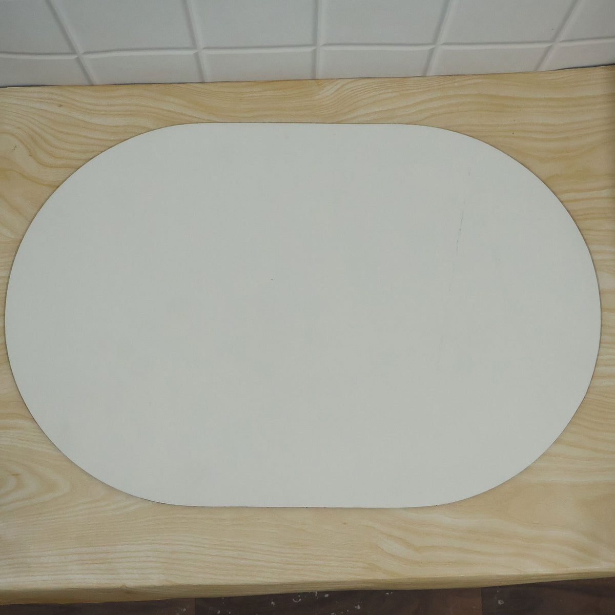 Decorative rounded floor mat with textured surface actual product