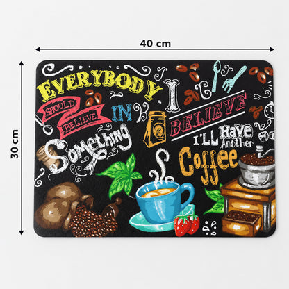 Black rectangular mat with coffee designs, displaying its dimensions of 40 cm by 30 cm.