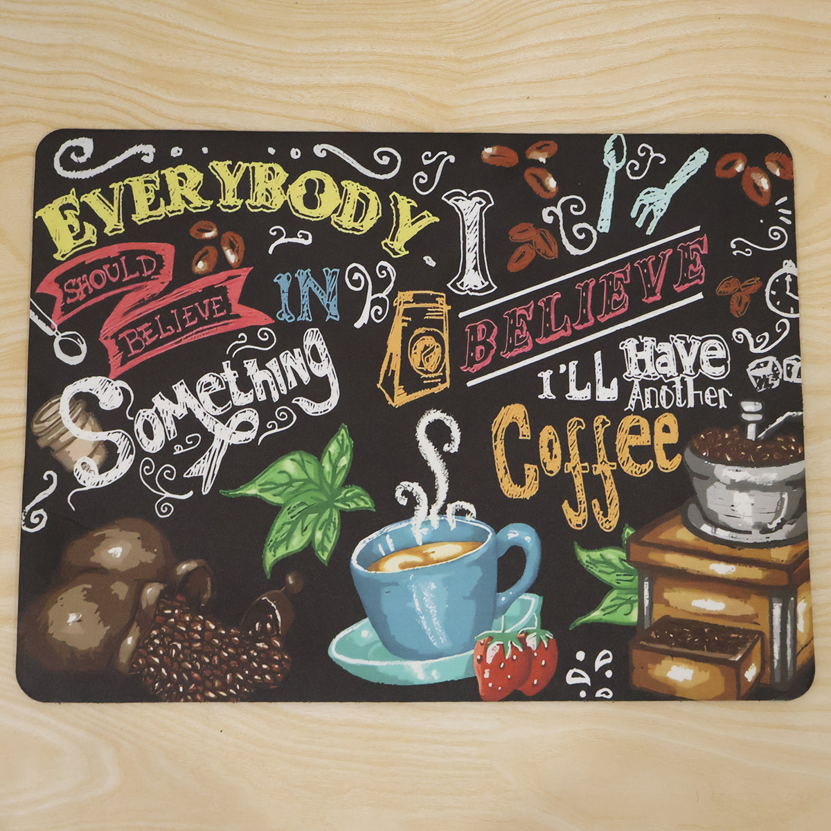 Coffee themed kitchen floor mat in use next to a coffee machine