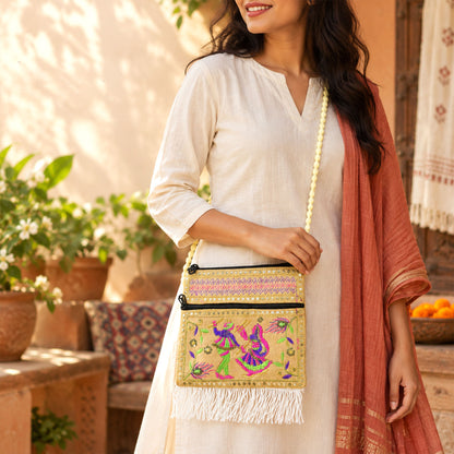 Traditional embroidered fringe jute sling purse
