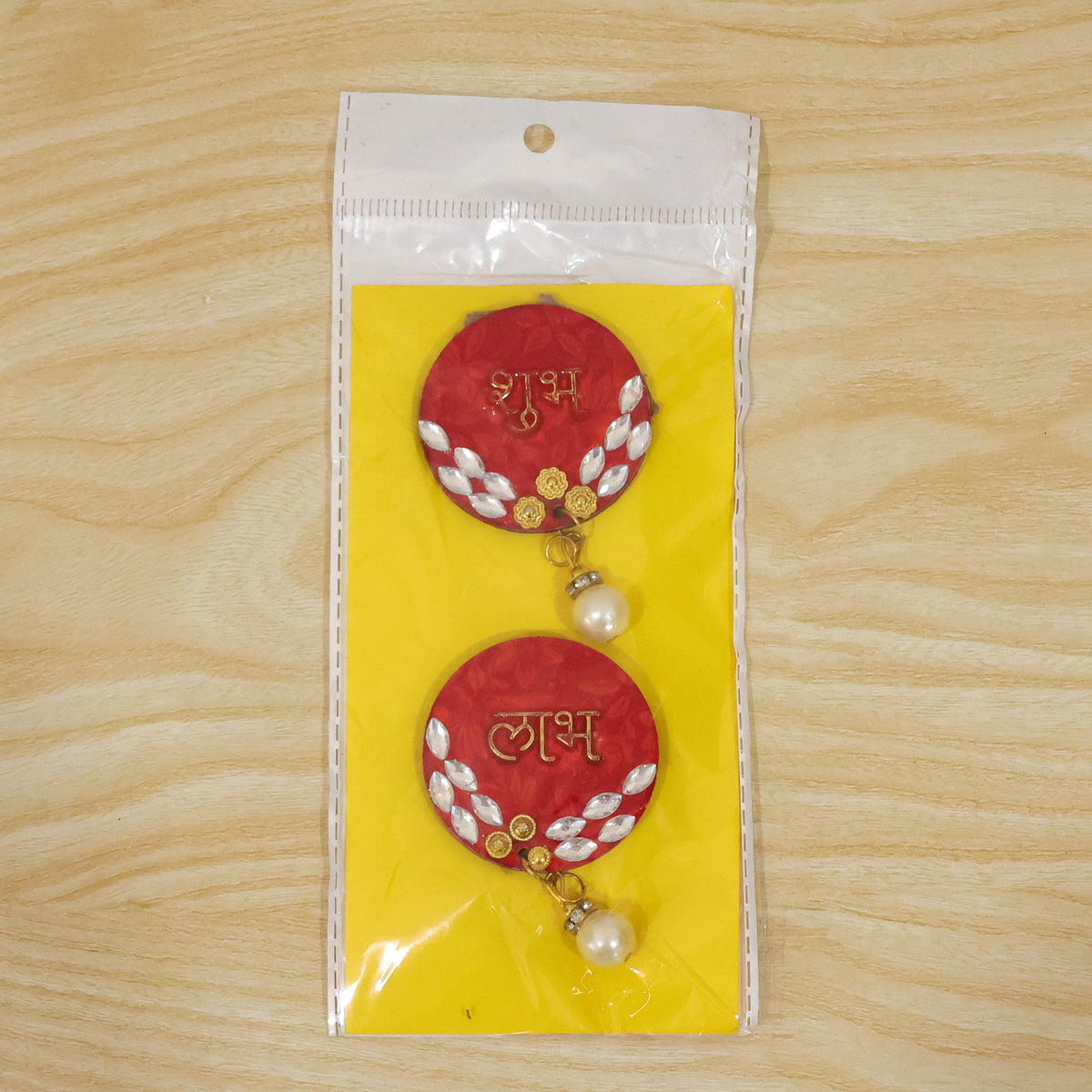 Red Shubh Labh door decor used in a festive home setting