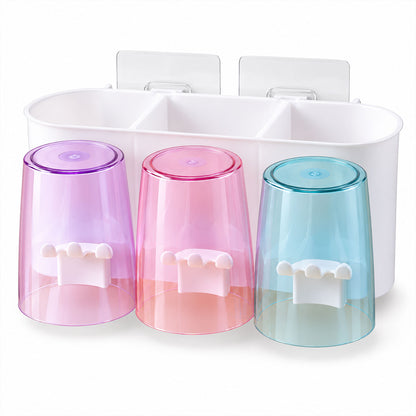 Wall mounted toothbrush holder with three cups - white background