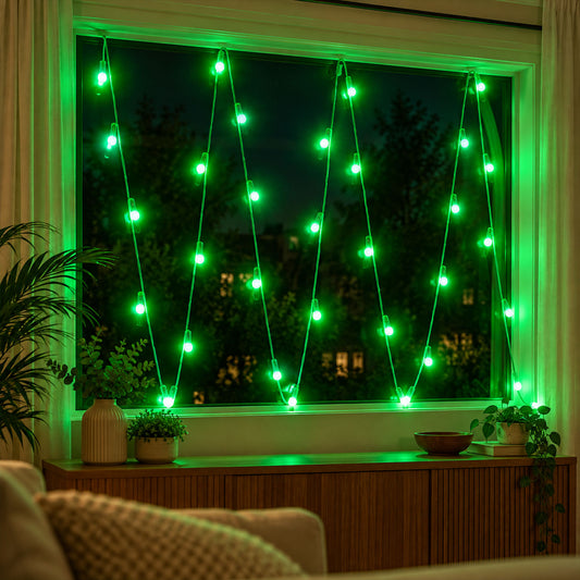 Bright green LED string lights illuminate a window at night, creating a festive glow in the room.