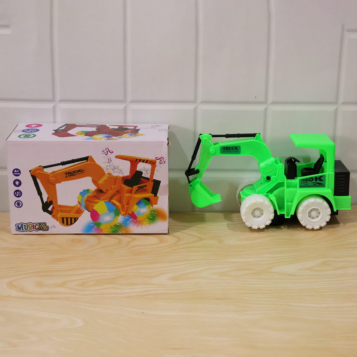 Musical excavator truck toy with RGB lights - actual product packaging