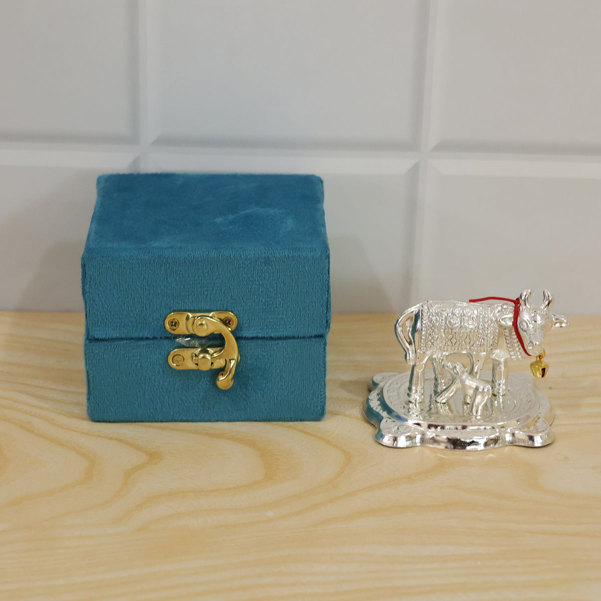 Silver finish Kamdhenu cow and calf idol with velvet box actual product
