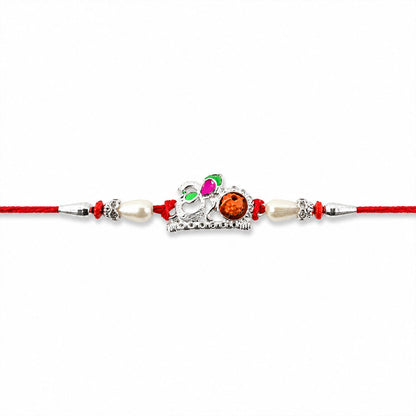 Red Gold Floral Om Rakhi with White Pearls and Orange Stone Center