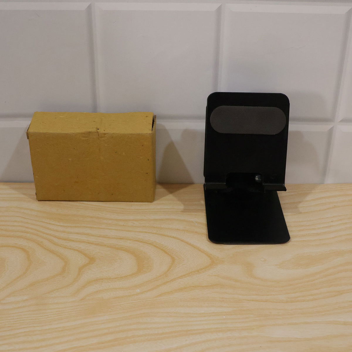 Foldable metal mobile phone stand - actual product and brown box