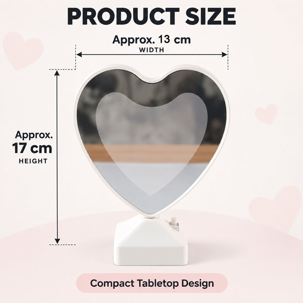 A heart-shaped mirror on a white base, with graphic overlays indicating its width and height dimensions.