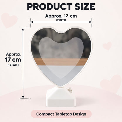 A heart-shaped mirror on a white base, with graphic overlays indicating its width and height dimensions.