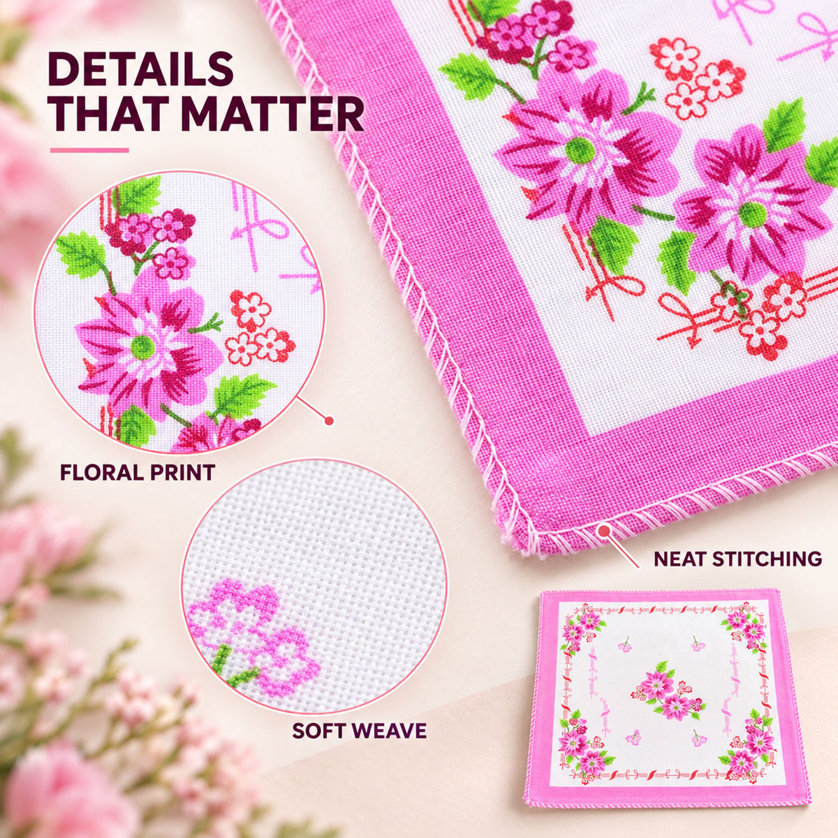 Close-up of a pink-bordered handkerchief with detailed floral print and neat stitching, highlighting the soft weave of the