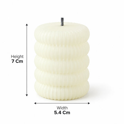 A single cream-colored ribbed flameless LED tealight candle with its height and width dimensions indicated.