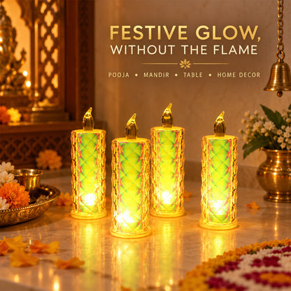 Four illuminated crystal LED candles with a warm yellow glow are displayed on a decorative surface with traditional Indian
