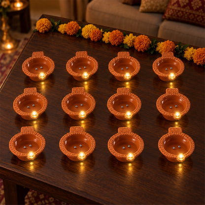 Close up of a single water sensor flameless LED diya glowing warmly